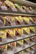 Plastic display specimens in the window of a shop for Japanese crepes in Takeshita-dori, Takeshita
