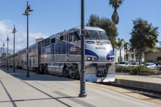 Scenic Amtrak train arriving at the historic Santa Barbara station in California