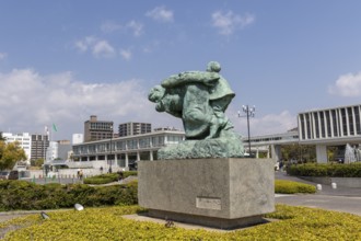 Statue of mother and children in the storm, bronze statue by the artist Shin Hongo in front of the