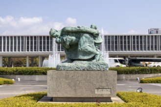Statue of mother and children in the storm, bronze statue by the artist Shin Hongo in front of the