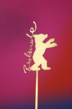 Background image, close-up, logo, golden bear with Berlinale lettering at a press conference during