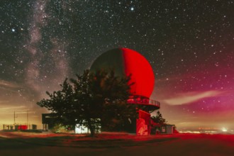 Milky Way above red radar dome. Wasserkuppe, Rhön, Hesse, Germany