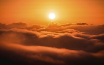 Bright sunrise over the sea of fog. Dettweiler Tempel, Königstein im Taunus, Hesse, Germany