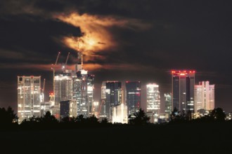 Night skyline with dramatic cloudy sky. City centre, Frankfurt am Main, Hesse, Germany St