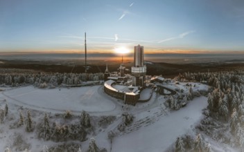 Winter landscape with atmospheric sunset. Großer Feldberg in the Taunus, Hesse, Germany
