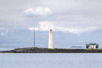 Grótta lighthouse on Iceland's coast in minimalist beauty. Seltjarnarnes, Reykjavik, Iceland