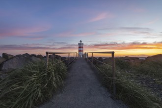Gardur lighthouse at sunset. Gardur, Reykjanes, Iceland