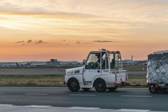 Cargo driver between runway and sunset. Frankfurt Airport, Hesse -Germany