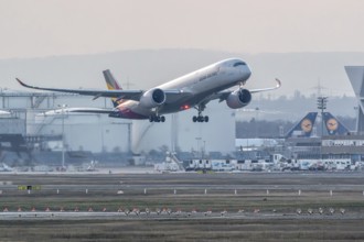 Airbus A350 of the Korean airline Asiana Airlines climbing. Frankfurt am Main Airport, Hesse,