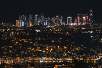 Sparkling skyline meets vibrant city lights on the Bosphorus. Istanbul, Turkey
