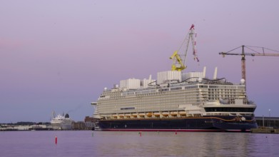 Cruise ship Disney Adventure, evening light, Wismar harbour
