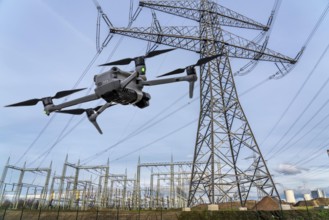 Symbolic image, photomontage, reconnaissance, spying with drones in industrial plants, critical