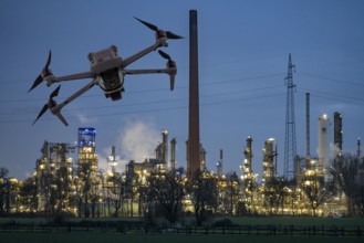 Symbolic image, photomontage, reconnaissance, spying with drones in industrial plants, critical