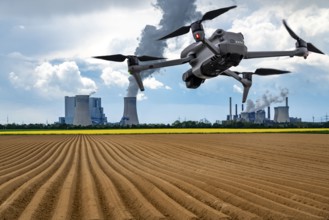 Symbolic image, photomontage, reconnaissance, spying with drones in industrial plants, critical