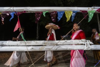Members of the tea tribe community celebrate the vibrant Karam Festival with traditional rituals at