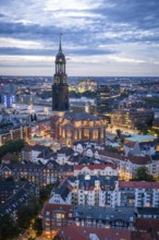 Aerial view of St Michael's Church with a view of the Hamburg bunker at blue hour, Hamburg, Germany