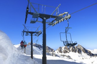 Chairlift, Alpe Tognola ski area, San Martino di Castrozza, Trentino, South Tyrol, Italy