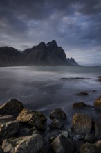 Mountains, mountain range, beach, sea, waves, surf, reflection, clouds, evening light, coast,