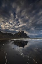 Mountains, mountain range, beach, sea, waves, surf, reflection, clouds, evening light, coast,