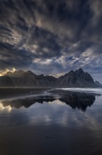 Mountains, mountain range, beach, sea, waves, surf, reflection, clouds, evening light, coast,