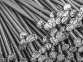 Full frame background showing lots of metallic nails