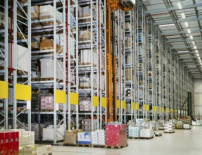High rack storage area with lots of pallets