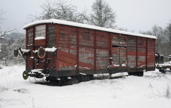 Outdoor shot of a old railway car in Southern Germany at winter time