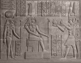 Ancient stone relief at Chnum temple in Egypt