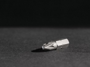 Closeup shot of a screwdriver bit in dark ambiance