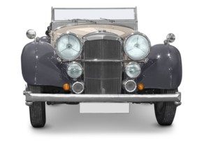 Nearly frontal shot of a classic car isolated in white back with shadow