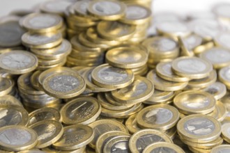 Full frame picture showing lots of 1 euro coins
