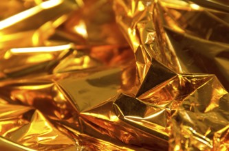 Full frame creased gold foil background