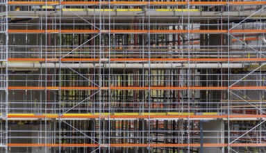 Construction theme showing a full frame scaffolding structure