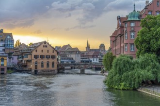 Idyllic waterside impression of Strasbourg, a city at the Alsace region in France at evening time