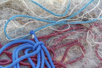 Full frame picture showing a tangled fishing net