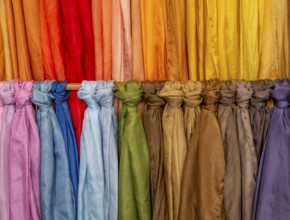 Full frame hanging colorful fabrics background