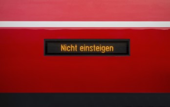 Nicht einsteigen lettering at a display om a train wagon in Germany