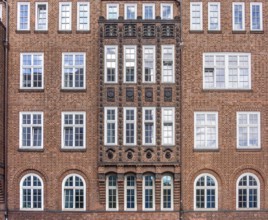 Frontal shot of a house facade seen in Hamburg