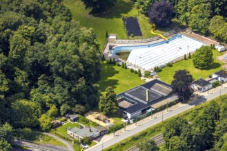 Aerial view, outdoor swimming pool Neheim, swimming pool without water, in the forest area at the