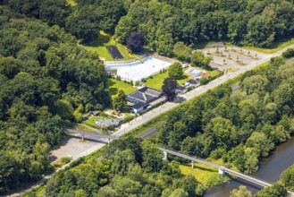 Aerial view, outdoor swimming pool Neheim, swimming pool without water, in the forest area at the
