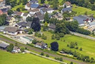 Aerial view, St. Joseph Chapel, Church Im Rohrbruch, residential area and meadow area, Uentrop,