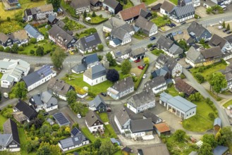 Aerial view, protestant church in the village centre and half-timbered houses, Berghausen, Bad