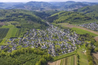 Aerial view, wooded hilly landscape, mountains and valleys, residential area local view district