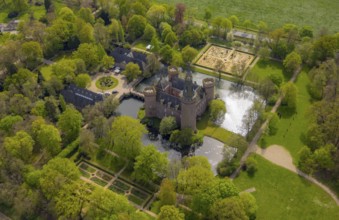Aerial view, Museum Schloss Moyland, neo-Gothic moated castle and castle park surrounded by meadows