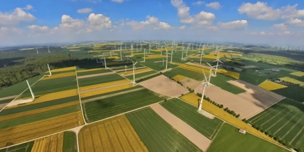 Aerial view, wind park and wind farm, wind turbine, wind turbines and tiled meadows and fields near