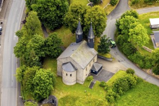 Aerial view, Banfe church in the village centre, green trees and tractor, Banfe, Bad Laasphe,