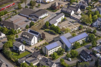 Aerial view, municipal administration town hall Bestwig with solar roof, town hall square, Lidl