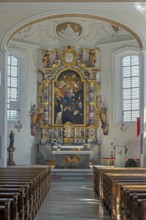 Main altar in the Roman Catholic parish church of the Assumption of the Virgin Mary in Gebrazhofen,