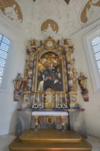 Main altar with image of the Virgin Mary in the Roman Catholic parish church of the Assumption of