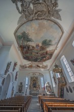 Interior of the Roman Catholic parish church of the Assumption of the Virgin Mary with ceiling